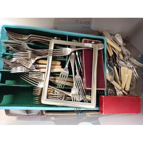 135 - A large collection of plated Cutlery including a Ladle, boxed items, Mugs, Nut Crackers, Grape Sciss... 