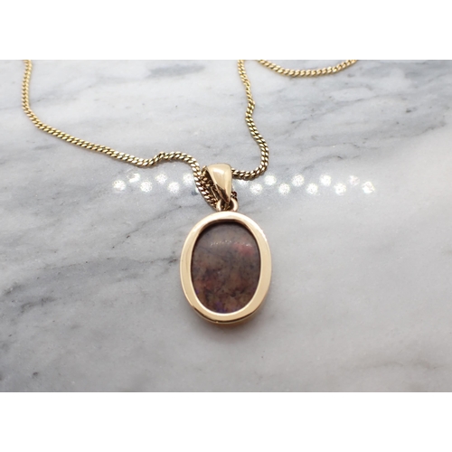 159 - A Boulder Opal Pendant set oval stone on 9ct gold fine chain, approx 5.20gms all in