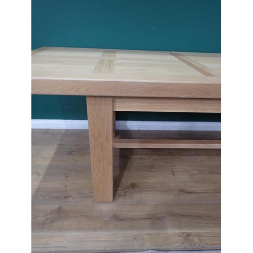 16 - A large modern oak Dining Table on square supports labelled Corndell Furniture 7' 3