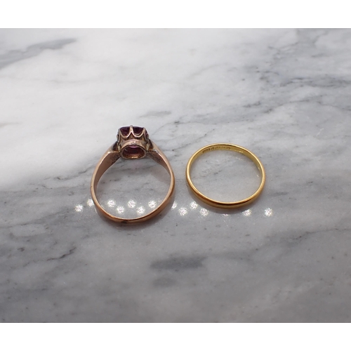 181 - A 22ct gold Wedding Band, approx 2.10gms and a 9ct gold Dress Ring claw-set cushion-cut garnet, ring... 