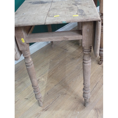 20 - A pine and beech Dropleaf Table fitted two drawers on turned supports A/F and a Victorian Pembroke T... 