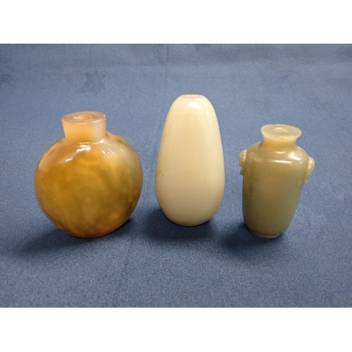 201 - Three jade type Snuff Bottles