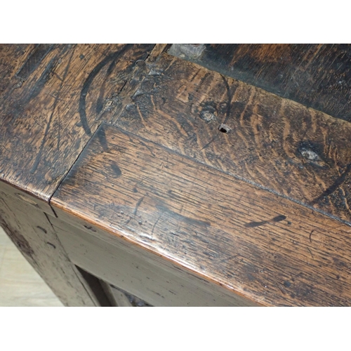 21 - A 16th Century and later oak Coffer with sunken three panel lid above four linenfold panels on front... 