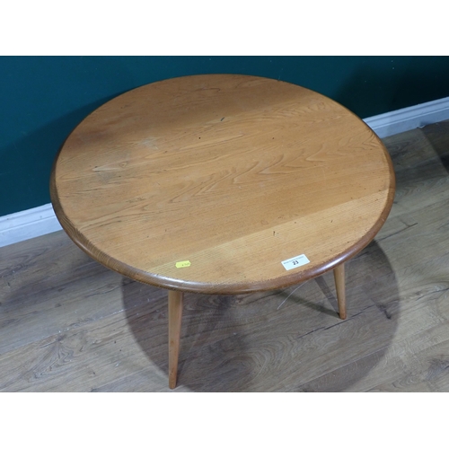 23 - An Ercol circular Coffee Table 2ft 5in D x 1ft 6in H