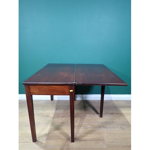 24 - A 19th Century mahogany fold over Tea Table on square supports 3ft W x 2ft 2in H