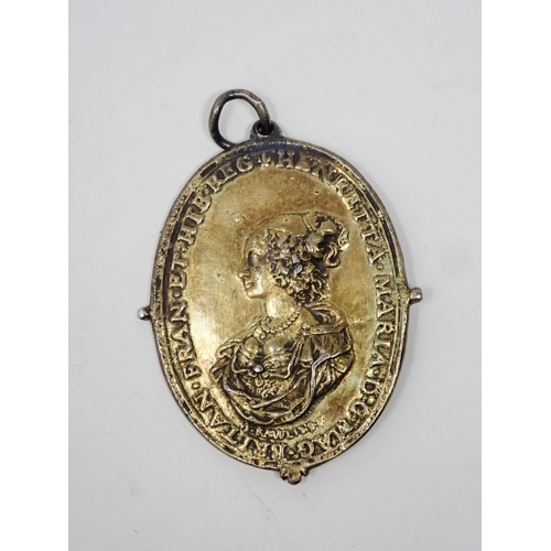 263 - A Charles I (1625-49) Royalist Badge, by Thomas Rawlins, gilded cast silver, with suspension loop. O... 