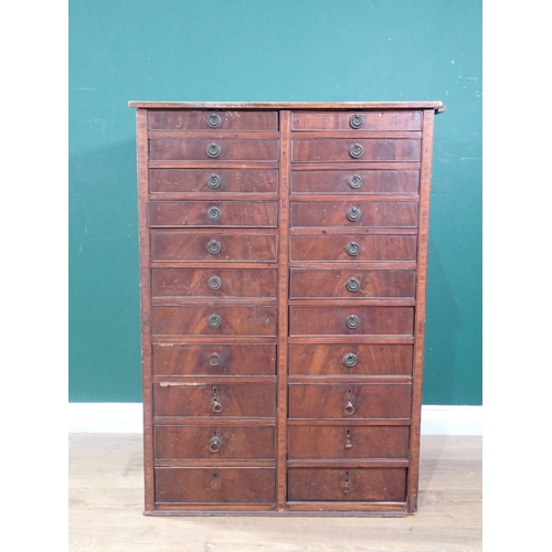 307 - A 19th Century mahogany bank of Twenty Two graduated Drawers, with ring handles and crossbanded deco... 