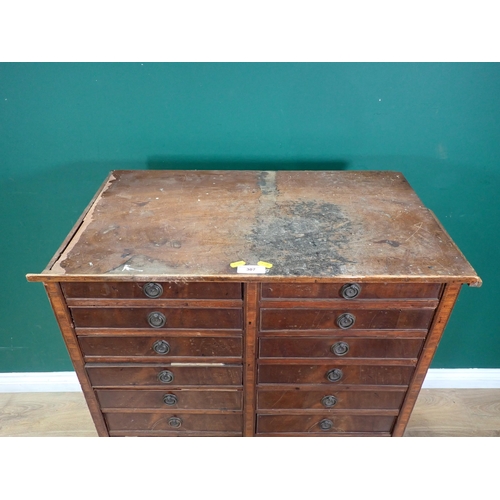 307 - A 19th Century mahogany bank of Twenty Two graduated Drawers, with ring handles and crossbanded deco... 