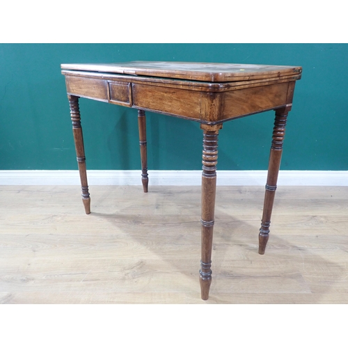 310 - A 19th Century fold over Card Table with green baize, on turned tapering supports A/F, 3ft Wide x 2f... 