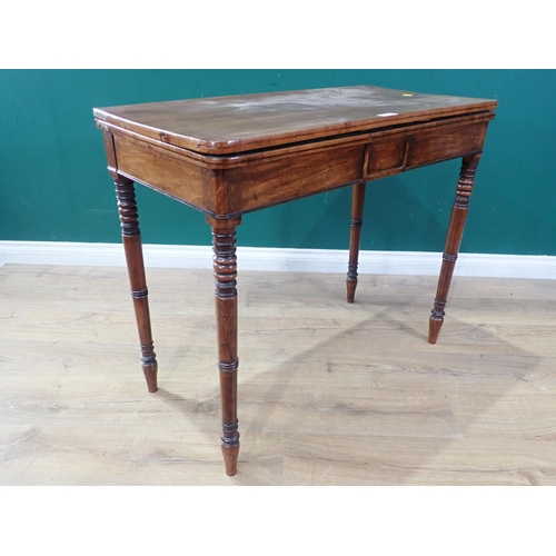 310 - A 19th Century fold over Card Table with green baize, on turned tapering supports A/F, 3ft Wide x 2f... 