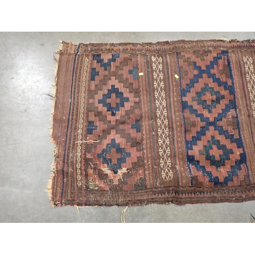 43 - A Kazak style Rug on blue ground with multi borders and large central motif and geometric designs, 5... 