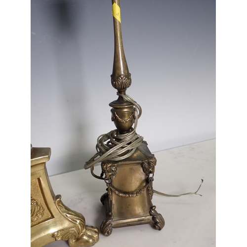 44 - A 19th Century Style brass Church Candlestick on paw feet 23