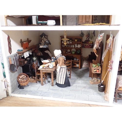 47 - A Thatched Cottage Dolls House with furniture, Garden, Veg Patch and Shed and wood store, 2ft 9