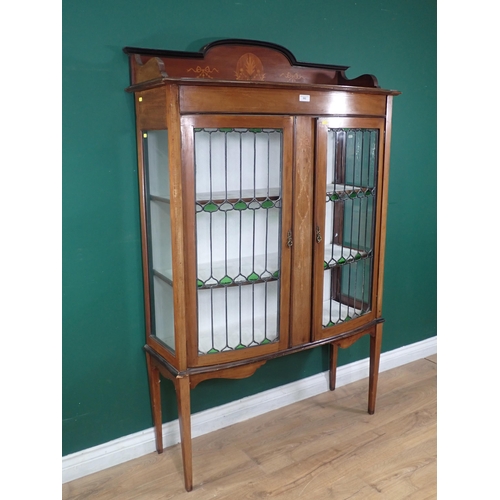 502 - A late Victorian mahogany and inlaid bow fronted Display Cabinet fitted pair of leaded glass doors m... 