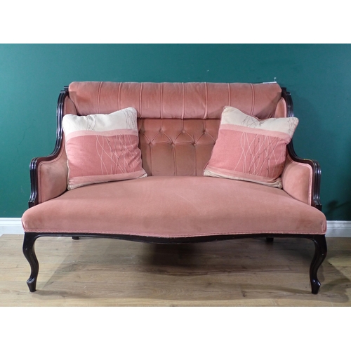 505 - A pink upholstered button back two seater Sofa on cabriole front supports, 4ft 3