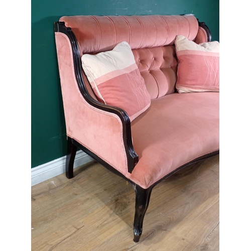 505 - A pink upholstered button back two seater Sofa on cabriole front supports, 4ft 3