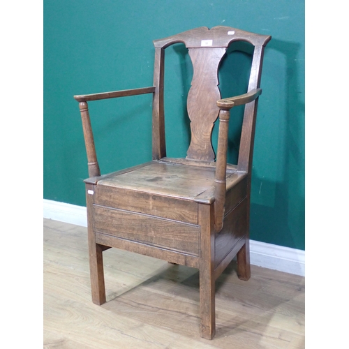 53 - An antique Elm splat back Commode Chair, A/F.