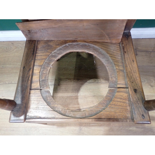 53 - An antique Elm splat back Commode Chair, A/F.