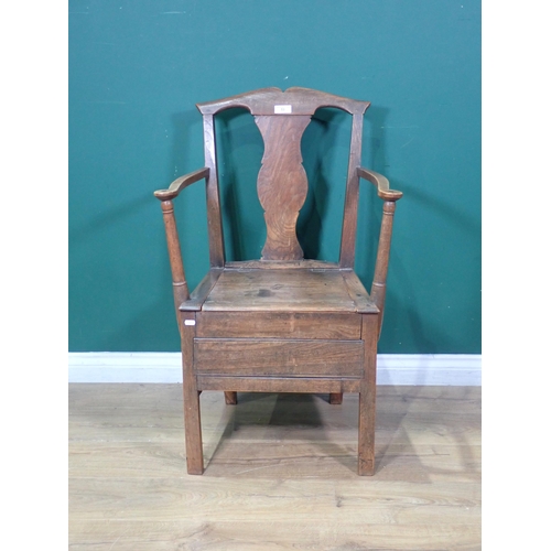 53 - An antique Elm splat back Commode Chair, A/F.