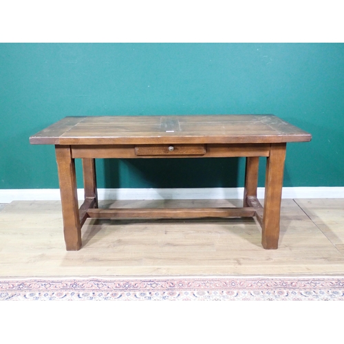 55 - An oak Refectory Table with single fitted drawer and two extension leaves, 5ft 4