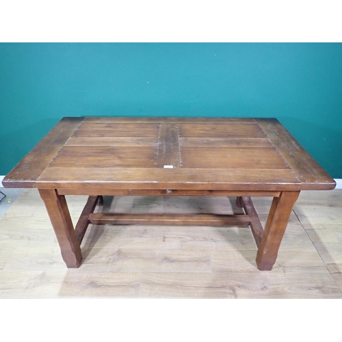 55 - An oak Refectory Table with single fitted drawer and two extension leaves, 5ft 4