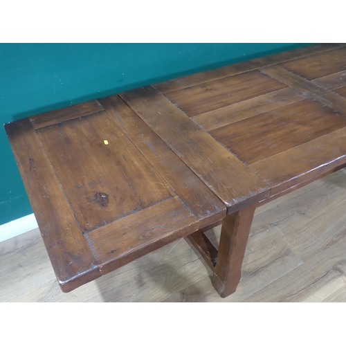 55 - An oak Refectory Table with single fitted drawer and two extension leaves, 5ft 4