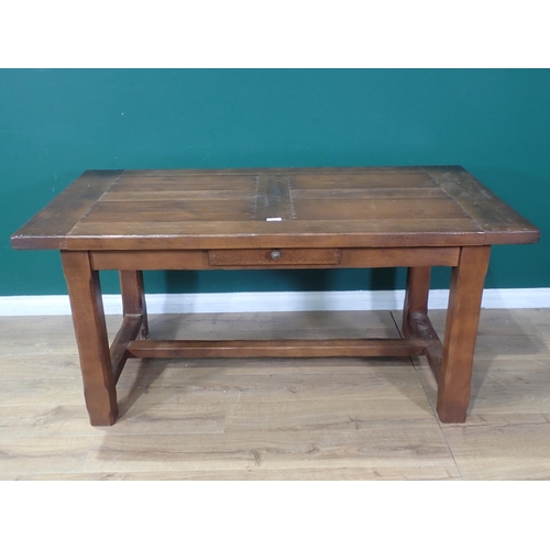 55 - An oak Refectory Table with single fitted drawer and two extension leaves, 5ft 4