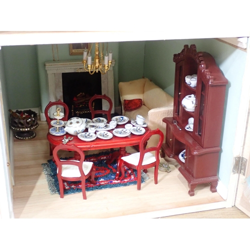 65 - A Georgian style Doll's House containing Furniture, musical Instruments and Dolls, passed PAT