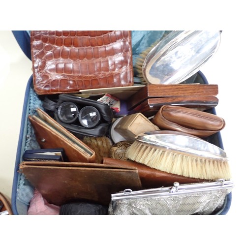 97 - A leather circular Collar Box and Contents, and a case of silver mounted Brushes, leather Wallets an... 