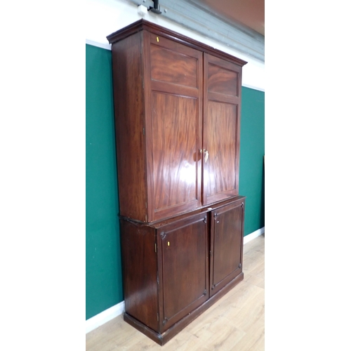 71 - A mahogany Bookcase the top section with pair of panelled doors fitted with adjustable shelves, with... 