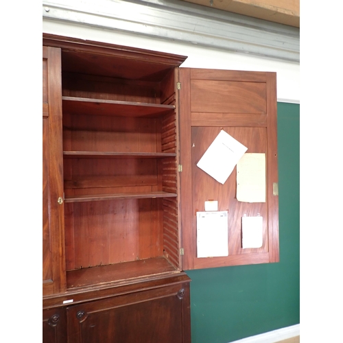 71 - A mahogany Bookcase the top section with pair of panelled doors fitted with adjustable shelves, with... 