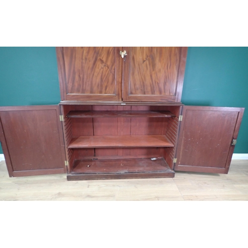 71 - A mahogany Bookcase the top section with pair of panelled doors fitted with adjustable shelves, with... 