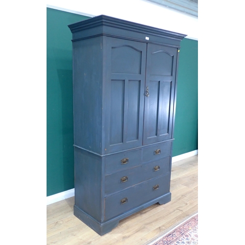 72 - A painted Oak Linen Press, the top with pair of panelled doors enclosing three slides, above a base ... 