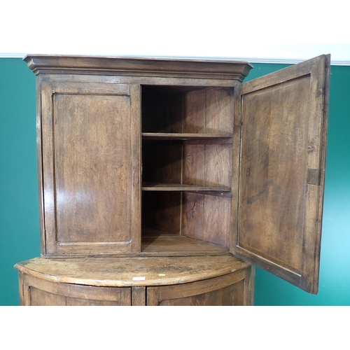 78 - An oak standing Double Corner Cupboard, 6ft 9