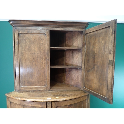 78 - An oak standing Double Corner Cupboard, 6ft 9