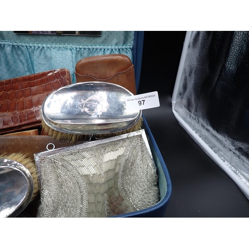 96 - A leather Dressing Case containing nine silver mounted Dressing Table Accessories, mostly with blue ... 