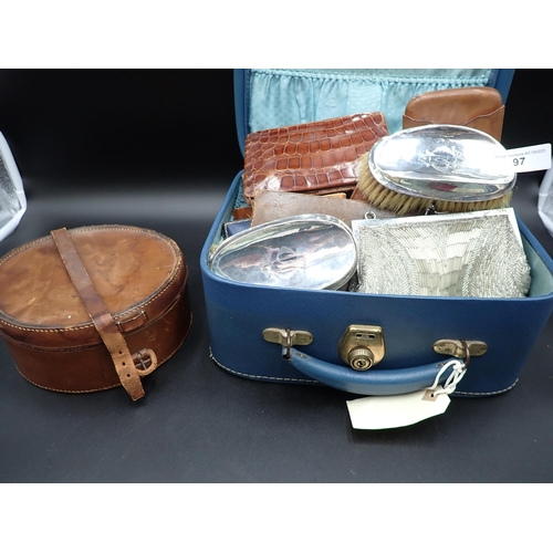 96 - A leather Dressing Case containing nine silver mounted Dressing Table Accessories, mostly with blue ... 