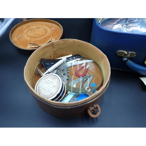 96 - A leather Dressing Case containing nine silver mounted Dressing Table Accessories, mostly with blue ... 