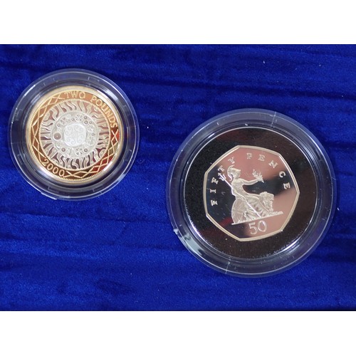 269 - A Royal Mint 2000 Millenium silver proof collection, 1p - £5, including a Maundy set, in case of iss... 