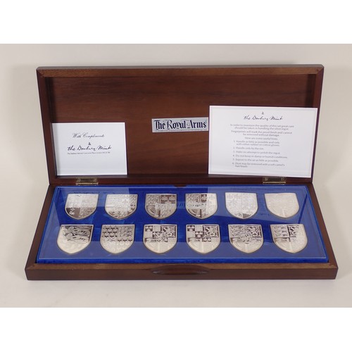 270 - A cased set of Danbury Mint ‘Royal Arms’ silver Medallic Plaques