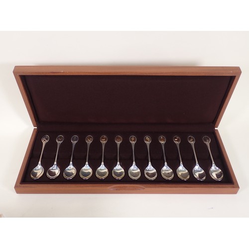 271 - A cased set of RSPB Danbury Mint hallmarked silver Spoons in fitted case with COA, along with a coll... 