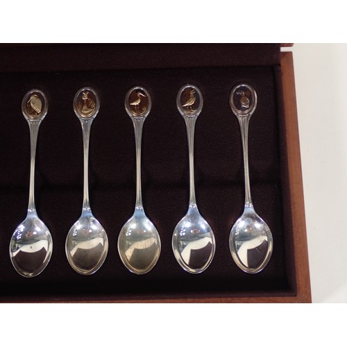 271 - A cased set of RSPB Danbury Mint hallmarked silver Spoons in fitted case with COA, along with a coll... 