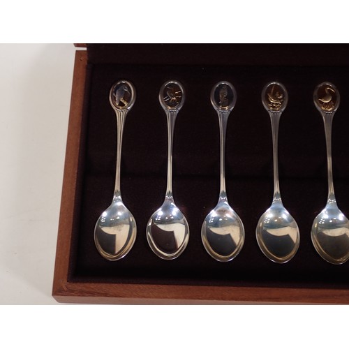 271 - A cased set of RSPB Danbury Mint hallmarked silver Spoons in fitted case with COA, along with a coll... 