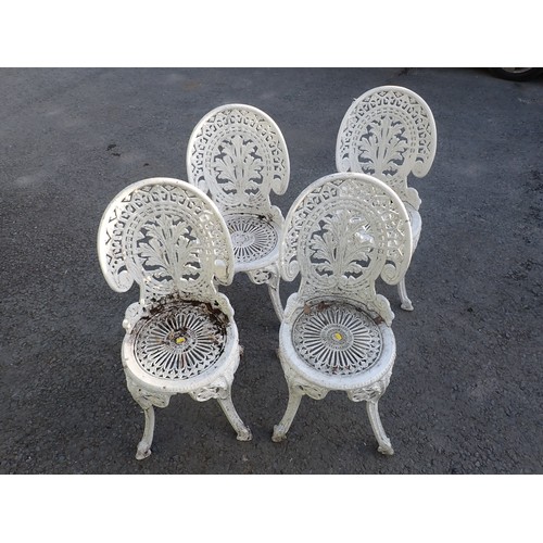 725 - A set of four white painted aluminium garden chairs