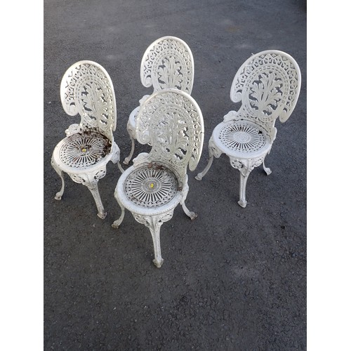 725 - A set of four white painted aluminium garden chairs