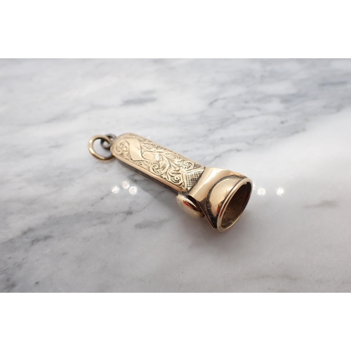 201 - A 9ct gold mounted Cigar Cutter with scroll engraving 40mm long