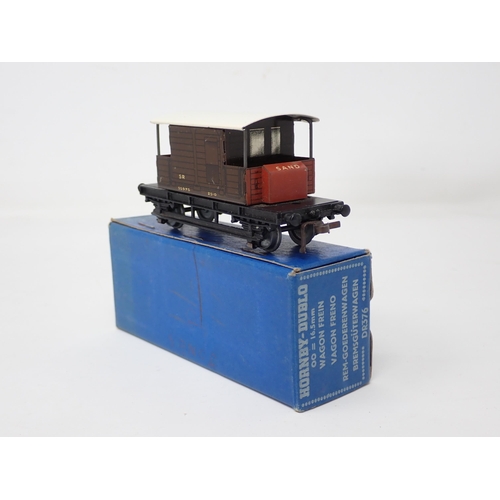 1008 - A Hornby Dublo D1 SR Goods Brake Van. Nr mint condition, box June 1950, some fading to the one end f... 