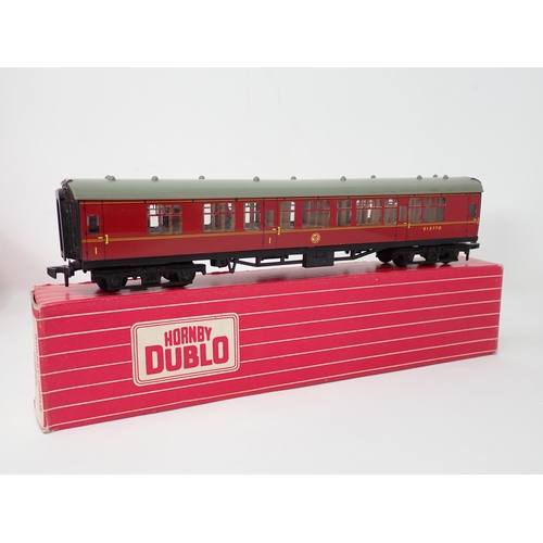 1012 - Seven Hornby Dublo BR 2-rail Coaches comprising 2x 4052, 4062, 2x 4063, 4075 and 4078. All in mint o... 