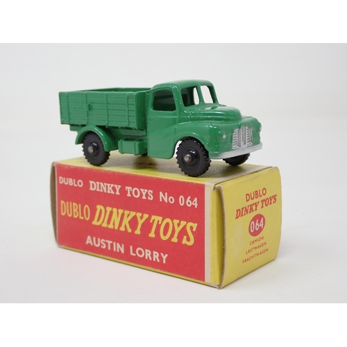 1014 - A rare boxed Dublo Dinky Toys No.064 black wheel Austin Lorry. Mint condition in superb correct non-... 