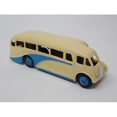 1017 - A Dinky Toys No.29e Single Deck Bus, cream and blue with blue hubs, mint condition. Ideal for layout